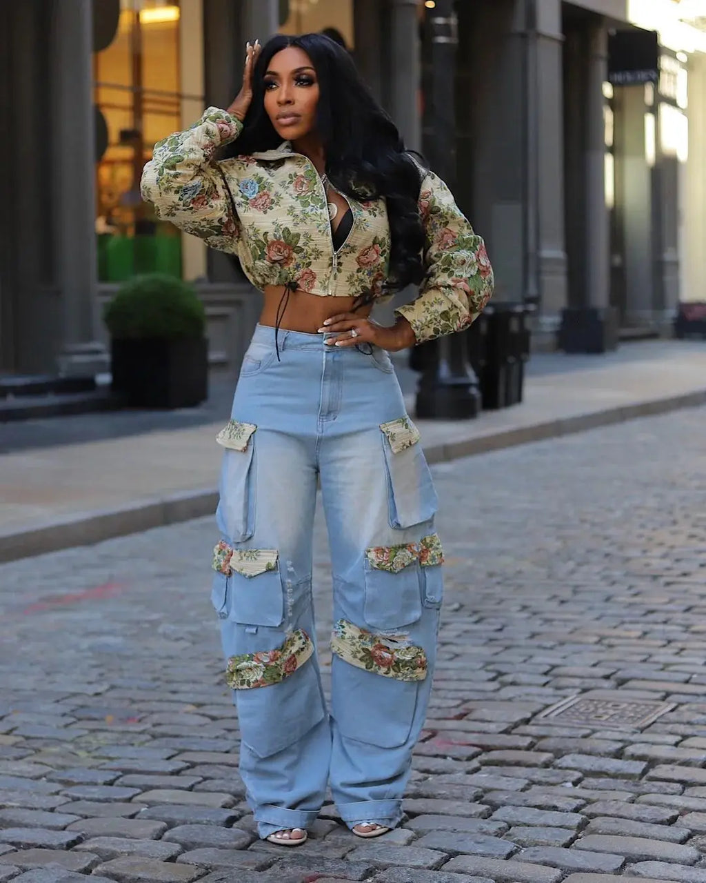 Alt Tag: Floral Bomber Crop Jacket & Cargo Patchwork Wide-Leg Jean Set on model, floral cropped bomber with high-waisted wide-leg cargo patchwork denim