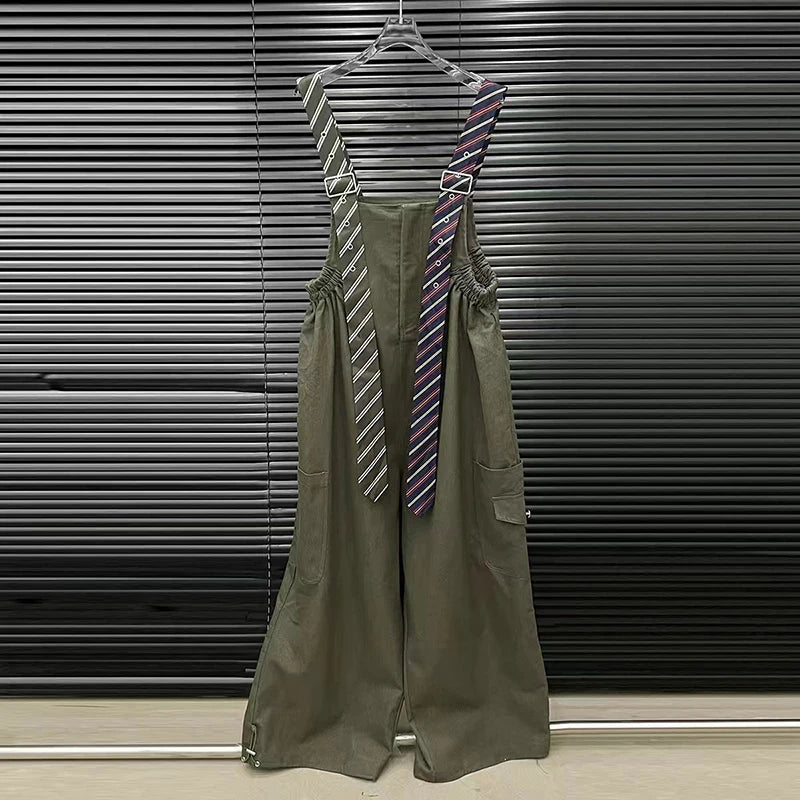 Executive Street Suspender Jumpsuit wide-leg high-waist olive jumpsuit with detachable tie-style suspenders on hanger