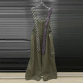 Executive Street Suspender Jumpsuit wide-leg high-waist olive jumpsuit with detachable tie-style suspenders on hanger