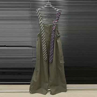 Executive Street Suspender Jumpsuit wide-leg high-waist olive jumpsuit with detachable tie-style suspenders on hanger