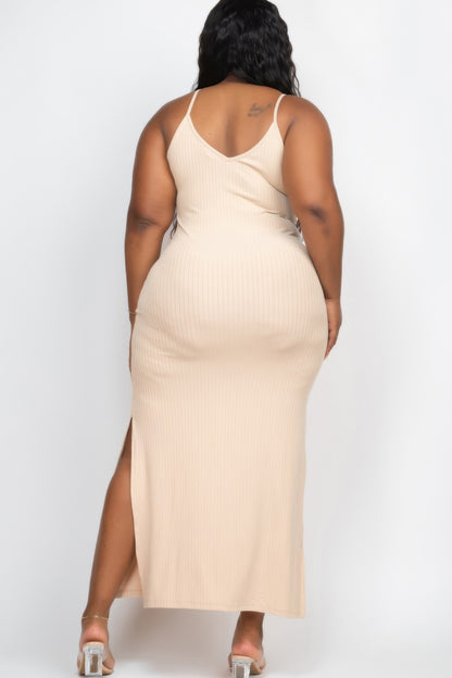 Back view of a model wearing a plus size ribbed maxi dress with side slits, showcasing a flattering silhouette.