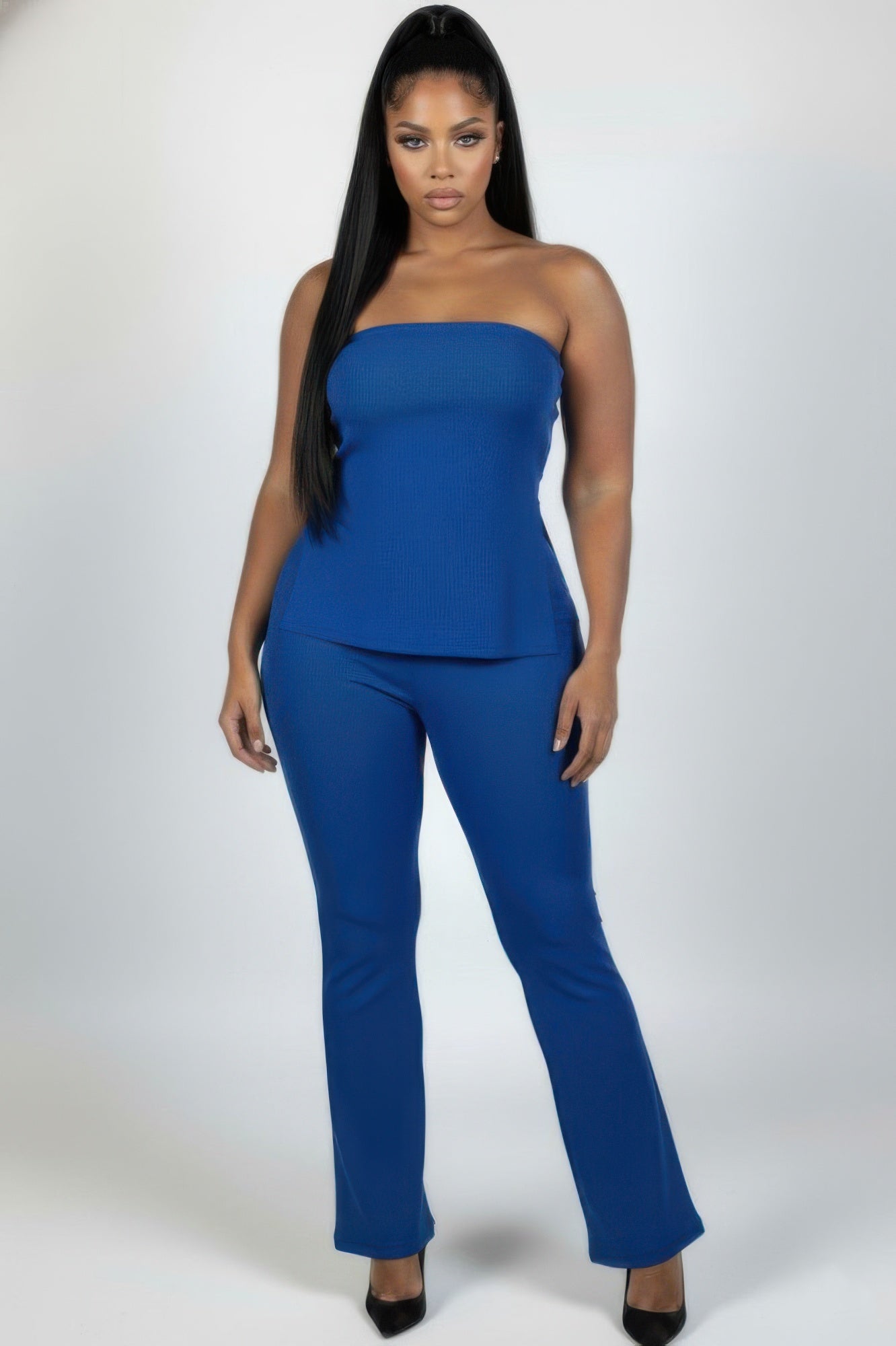 Plus size ribbed tube top and flare pants set in blue, featuring a sleek design and confident fit for stylish curves.