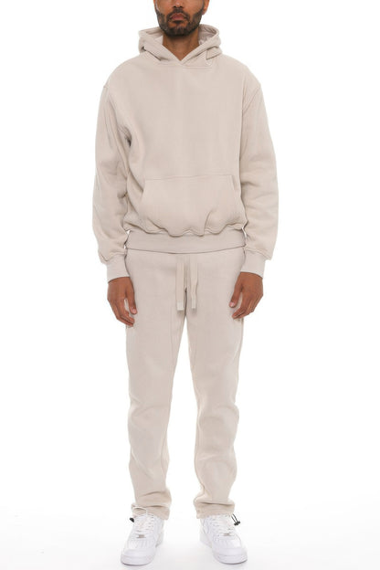 Premium cotton blend hoodie set modeled by a man, showcasing a soft oversized fit perfect for casual wear.