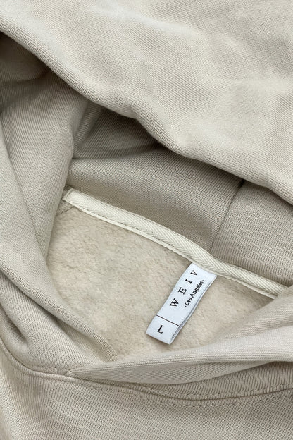 Inside view of a premium cotton blend hoodie set showcasing the soft fabric and label details.
