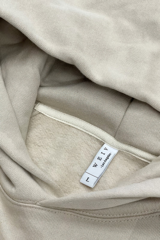 Inside view of a premium cotton blend hoodie set showcasing the soft fabric and label details.