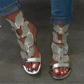 Sparkling Crystal Butterfly Ankle-Strap Gladiator Sandals in silver, featuring intricate butterfly details and an open-toe design.