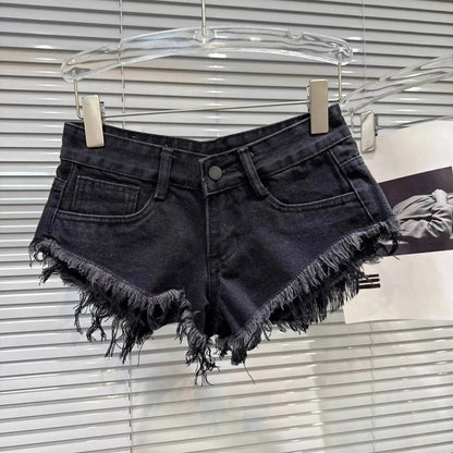 Distressed Raw-Hem Low-Rise Denim Shorts on display with frayed hem and fitted low-rise waist.