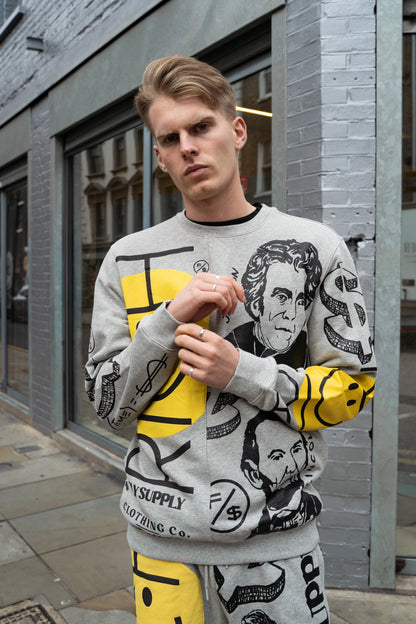 Graphic Statement Shorts worn with matching graphic sweater in bold streetwear print.