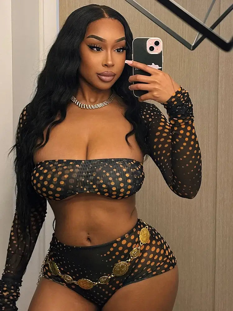 Gold Polka Dot Mesh 3-Piece Crop Top & Shorts Set showcased by a model in a mirror selfie with sheer black and gold details.