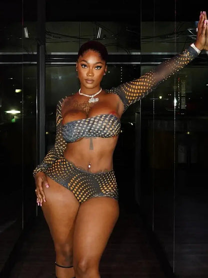 Model showcasing the Gold Polka Dot Mesh 3-Piece Crop Top & Shorts Set in a chic setting.