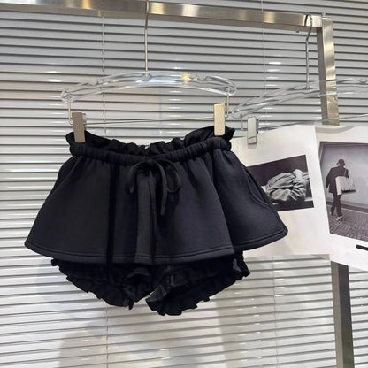 Layered Ruffle Drawstring Mini Skort hanging display featuring ruffled layers and adjustable drawstring waist.