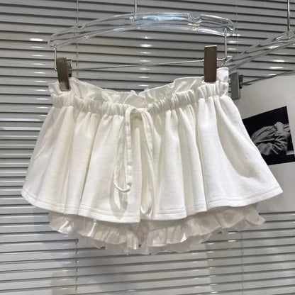 Layered Ruffle Drawstring Mini Skort displayed on a hanger, showcasing its playful layered design and elastic waistband.