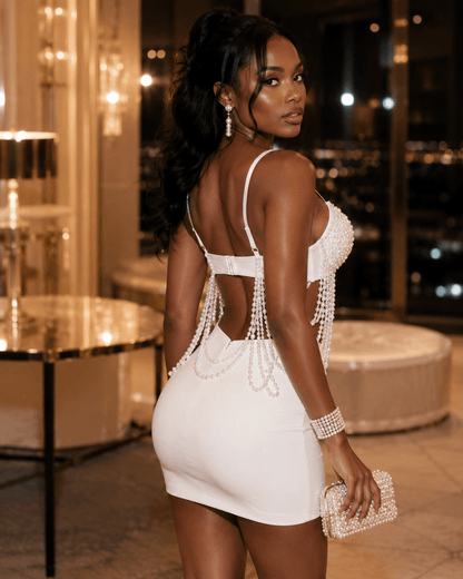 Model wearing a Pearl-Effect Beaded Fringe Bustier Crop Top, showcasing its elegant design and beaded details.