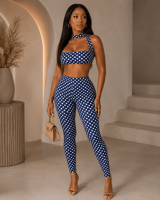 Retro polka dot crop top set featuring a bandeau style and high-waist leggings, perfect for a stylish look.
