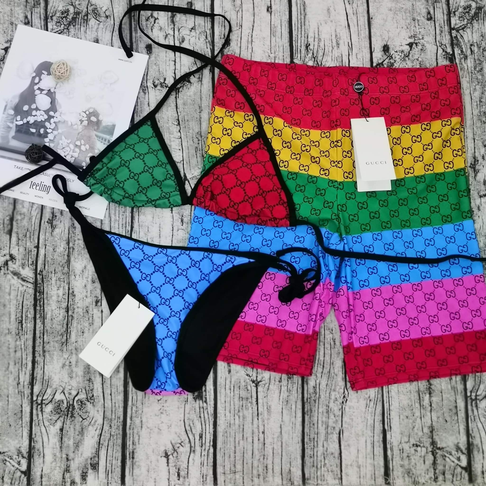 His and Her Matching Monogram Swimwear featuring bold multicolor prints, ideal for beach vacations and summer getaways.