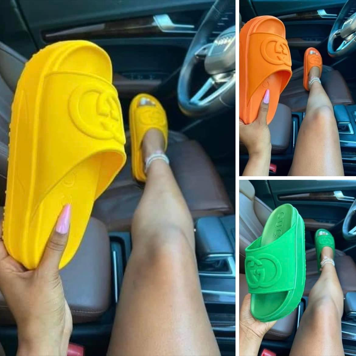 womens platform slide sandals in vibrant colors, displayed in a car, showcasing comfort and style.