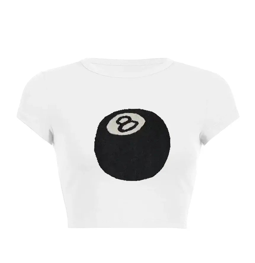 Women’s Assorted Graphic Short Sleeve Crop Tee featuring a playful 8-ball graphic design on a white background.