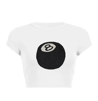 Women’s Assorted Graphic Short Sleeve Crop Tee featuring a playful 8-ball graphic design on a white background.
