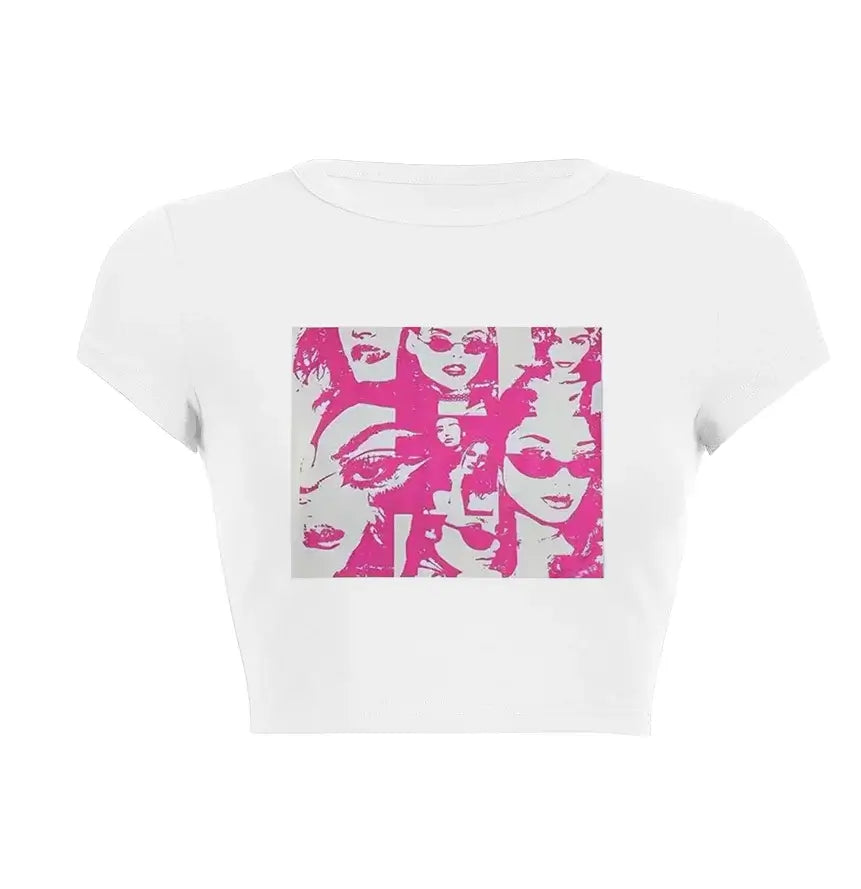 Women’s Assorted Graphic Short Sleeve Crop Tee featuring a vibrant pink face illustration design.