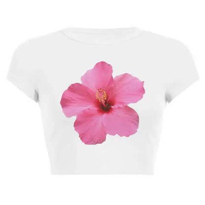 Women’s Assorted Graphic Short Sleeve Crop Tee featuring a vibrant pink hibiscus flower design on a white background.