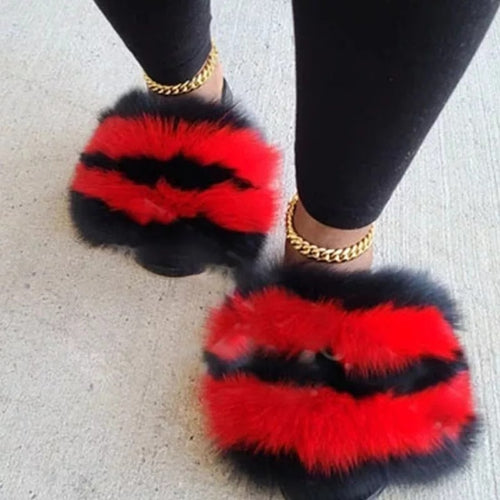 Faux fur slides in red and black with plush faux fur design, perfect for stylish comfort and casual wear.