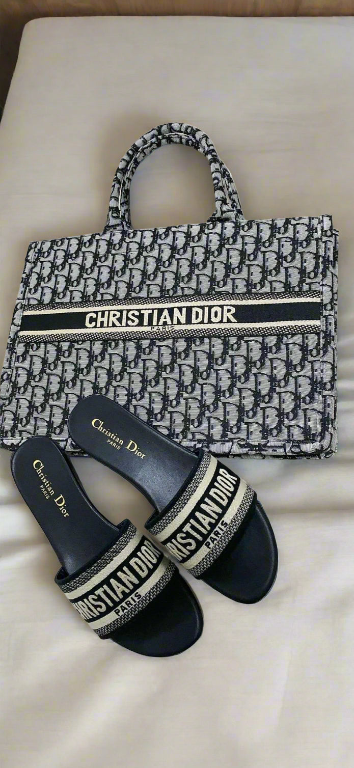 canvas tote and slide sandals set featuring a structured monogram design in black and white.