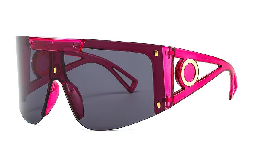 Hater Blocking Sunglasses with gradient photochromic lenses in a stylish pink frame.
