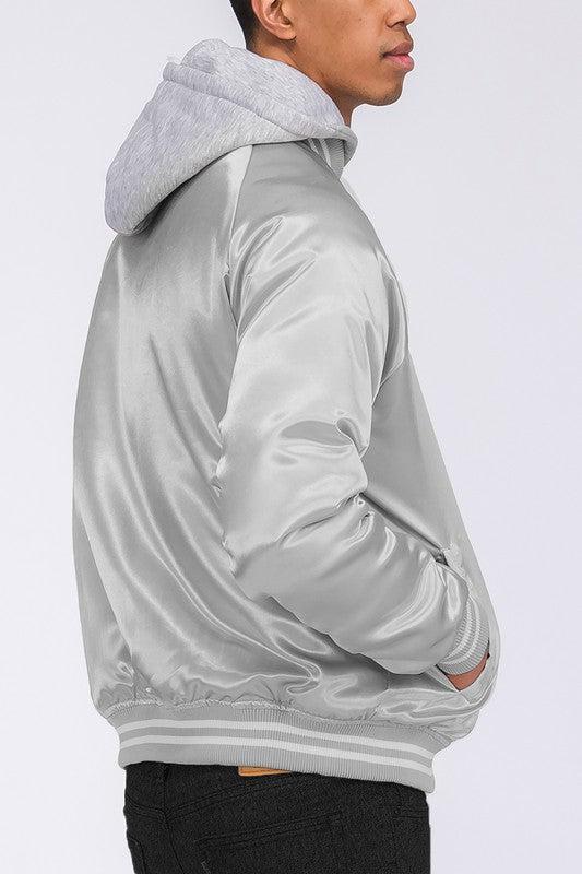 Side view of a man wearing a men's satin bomber jacket, showcasing its sleek design and stylish gray color.