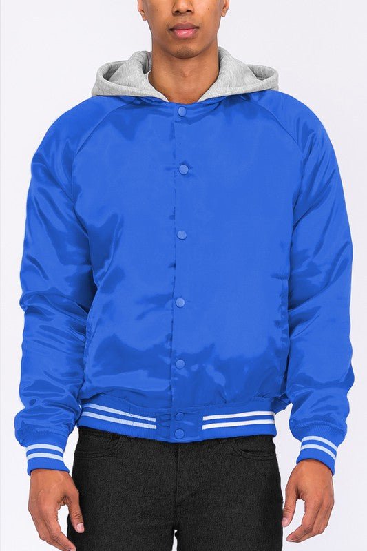 Men's satin bomber jacket in blue with grey hoodie, showcasing modern streetwear style.