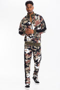 camo tracksuit set on a model, featuring a zip jacket and jogger pants in bold camouflage pattern